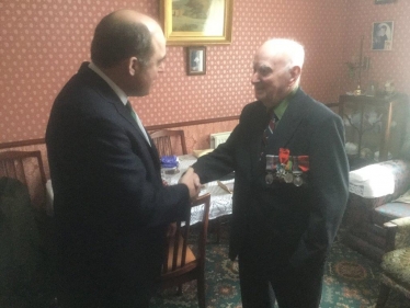 MP Ben Wallace presenting the Legion d’honneur to Mr Townsley 